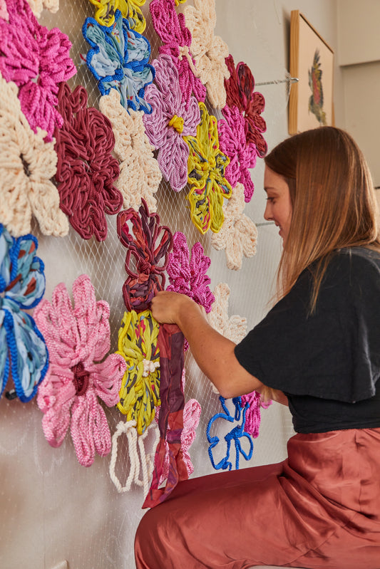 Frankie Meaden working on Just Joy giant embroidery in her home studio